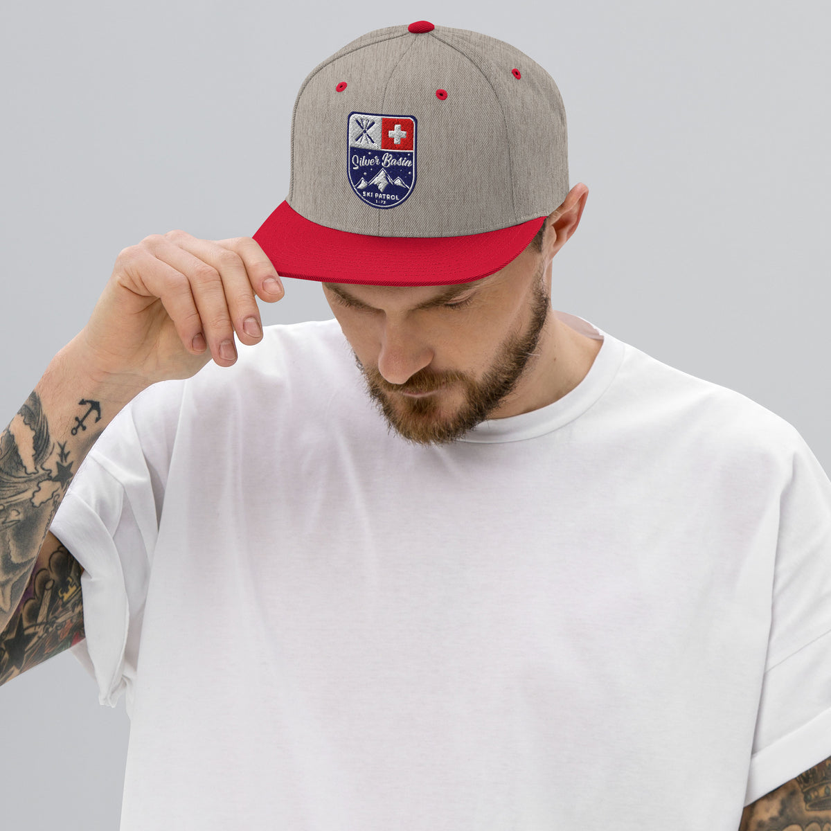 Silver Basin Ski California vintage graphic, printed on a SodaPop Cool snapback hat.