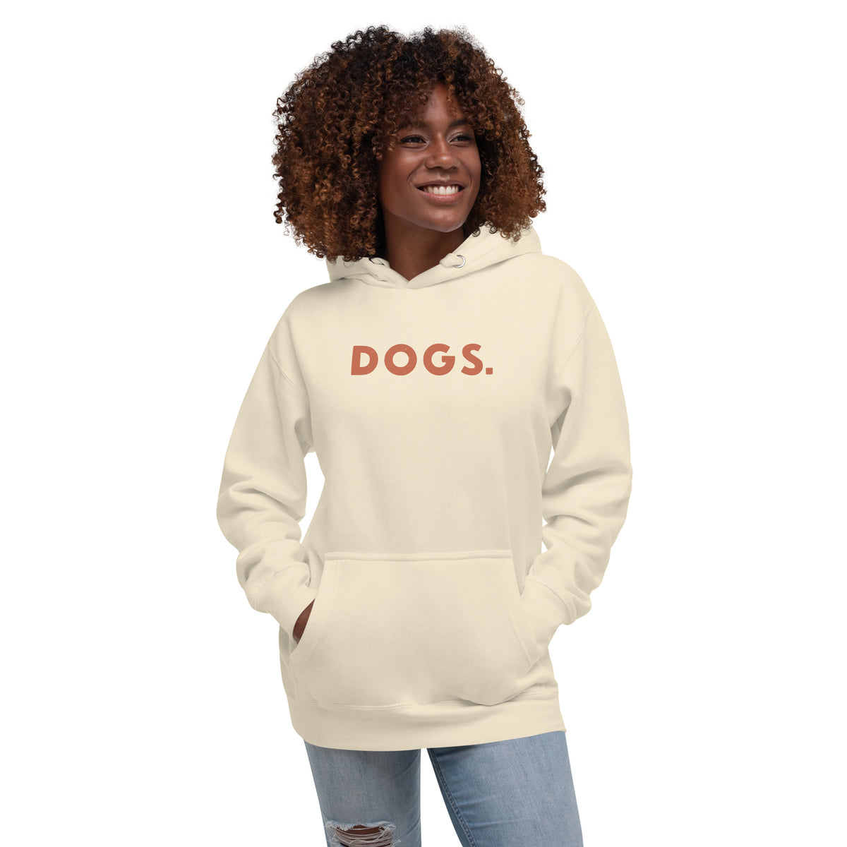 The word "Dogs." with a full stop, in vintage print styling, printed on a SodaPop Cool hoodie.