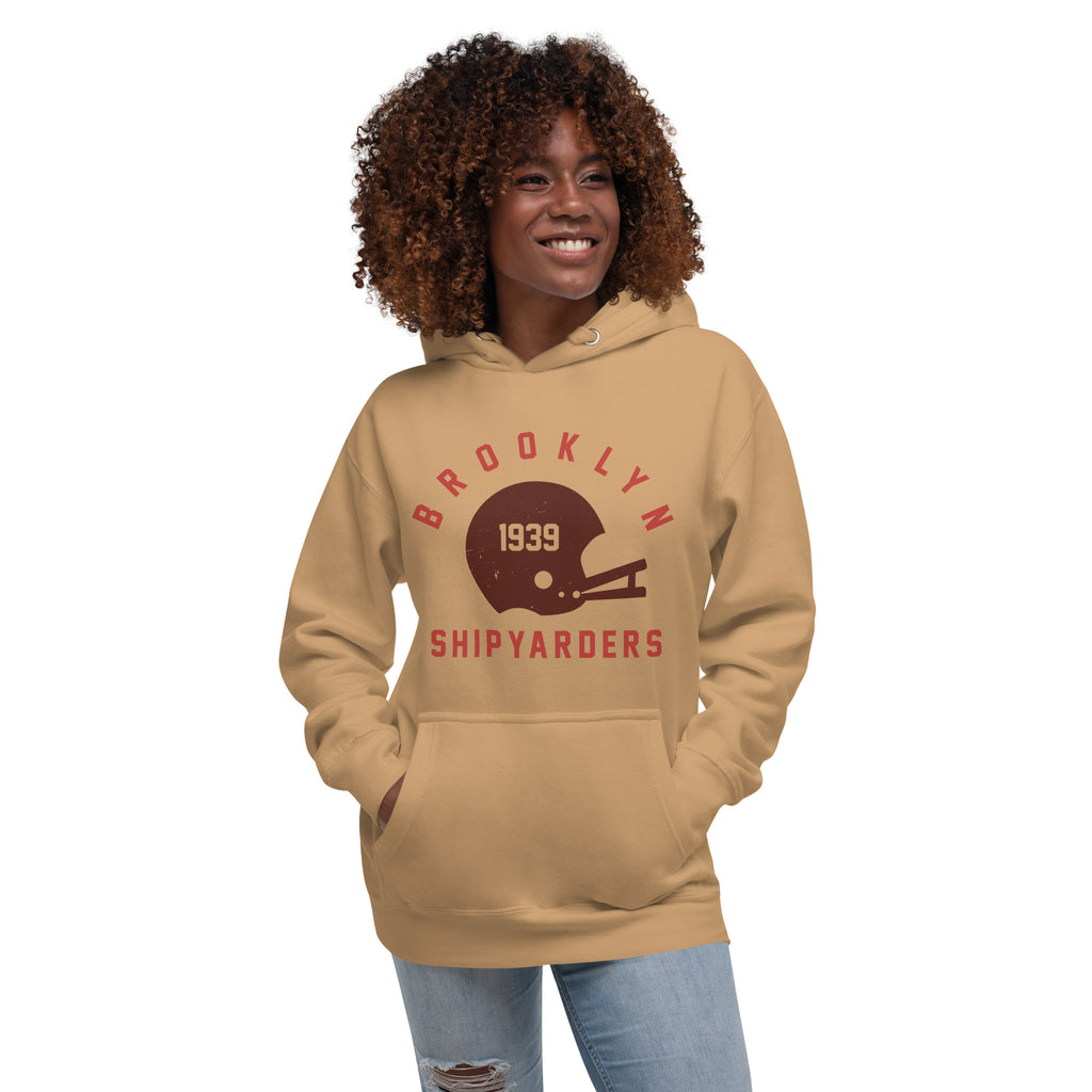 Vintage leather football helmet with "Brooklyn Shipyarders 1939", printed on a SodaPop Cool hoodie.