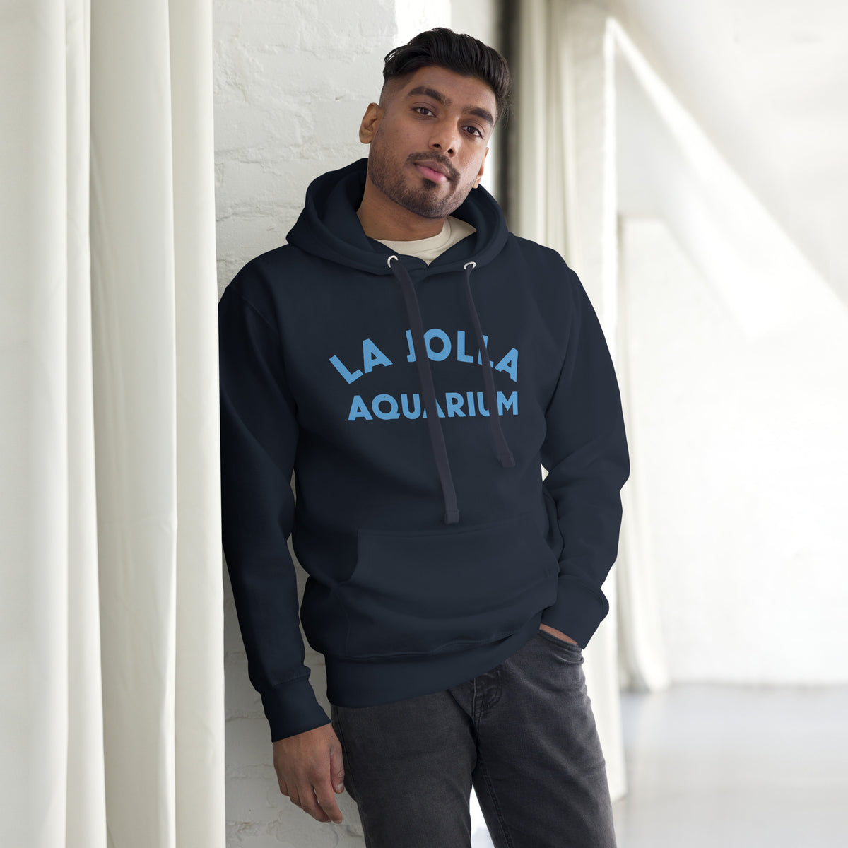 "La Jolla Aquarium" in classic vintage type, printed on a SodaPop Cool hoodie.