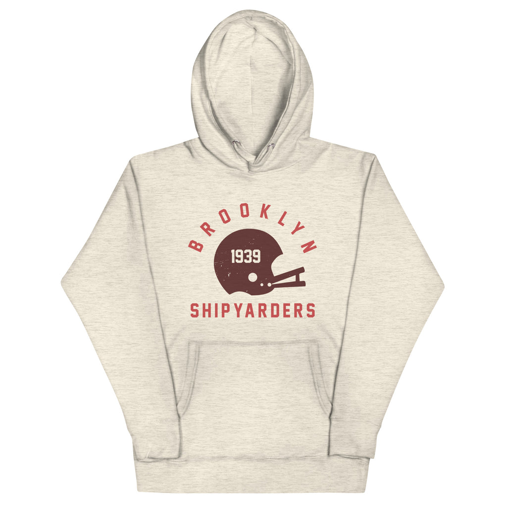 Vintage leather football helmet with "Brooklyn Shipyarders 1939", printed on a SodaPop Cool hoodie.