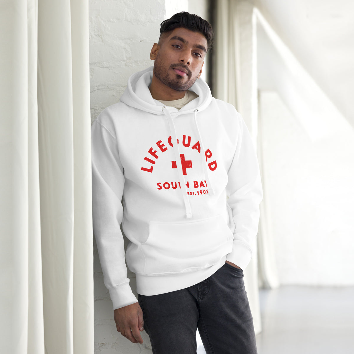 Lifeguard South Bay California 1907 vintage graphic, printed on a SodaPop Cool hoodie.