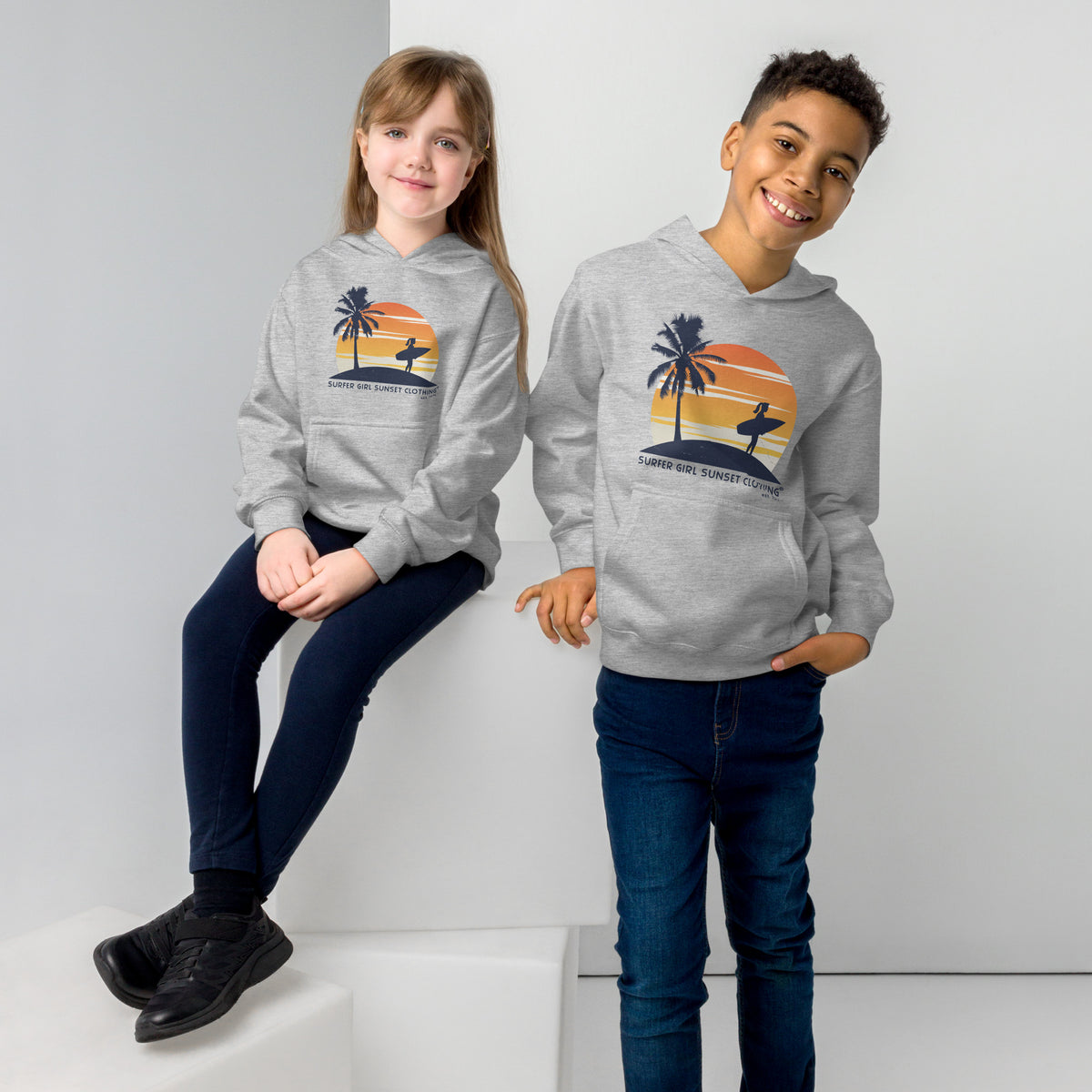 Surfer Girl Sunset Clothing vintage graphic, printed on a SodaPop Cool kids hoodie.