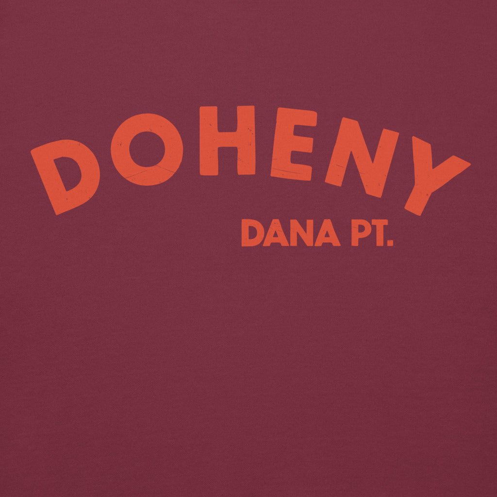 "Doheny Dana Point" in vintage California surf lettering, printed on a SodaPop Cool hoodie.