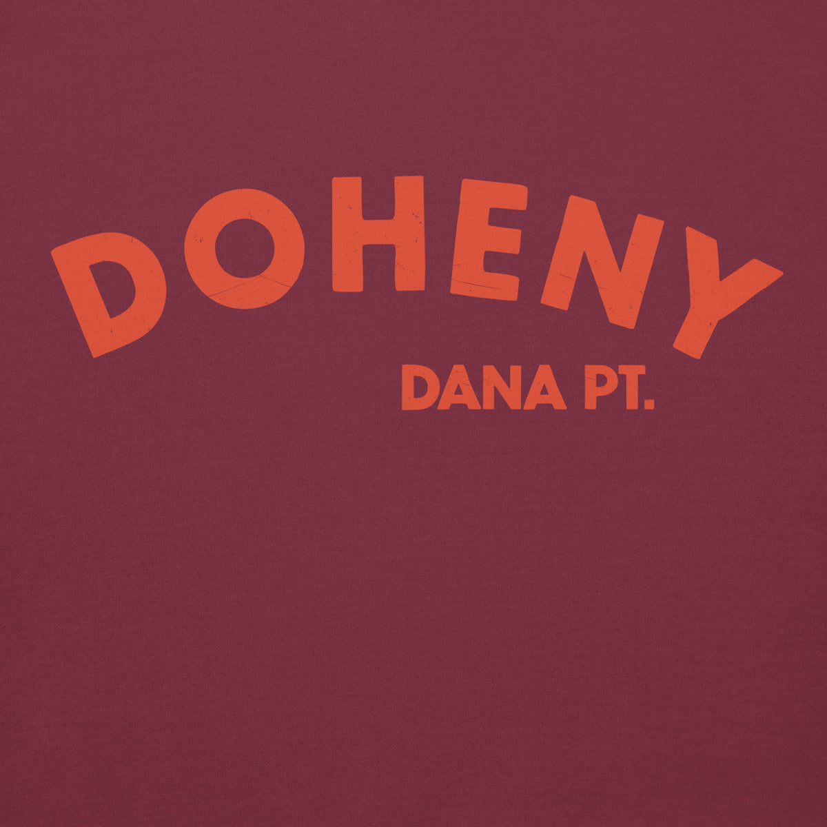 "Doheny Dana Point" in vintage California surf lettering, printed on a SodaPop Cool hoodie.