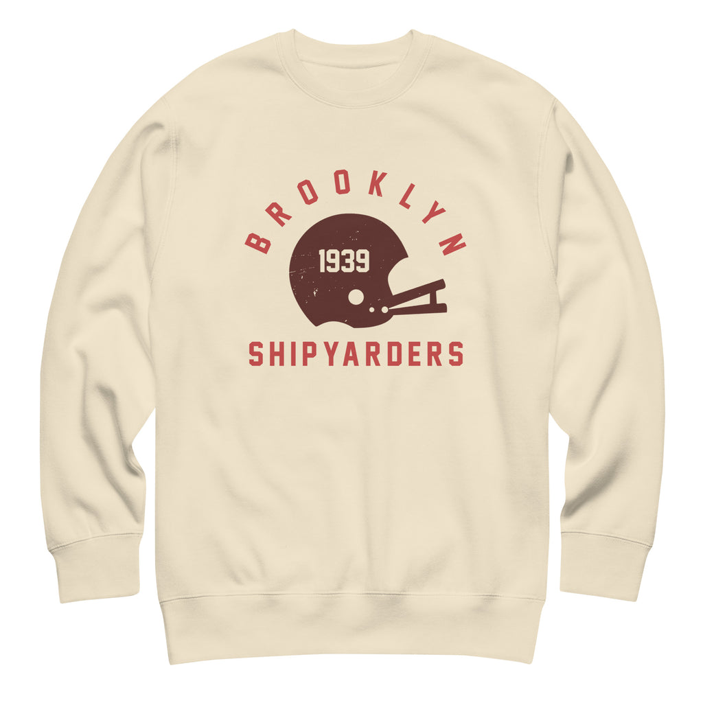 Vintage leather football helmet with "Brooklyn Shipyarders 1939", printed on a SodaPop Cool crew sweatshirt.