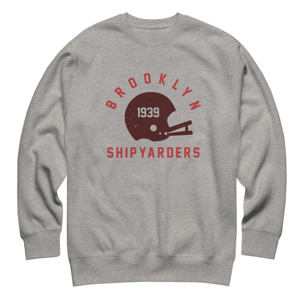 Vintage leather football helmet with "Brooklyn Shipyarders 1939", printed on a SodaPop Cool crew sweatshirt.