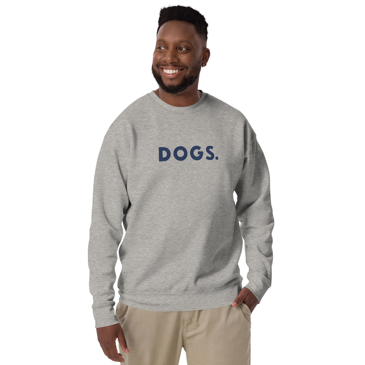 The word "Dogs." with a full stop, in vintage print styling, printed on a SodaPop Cool crew sweatshirt.