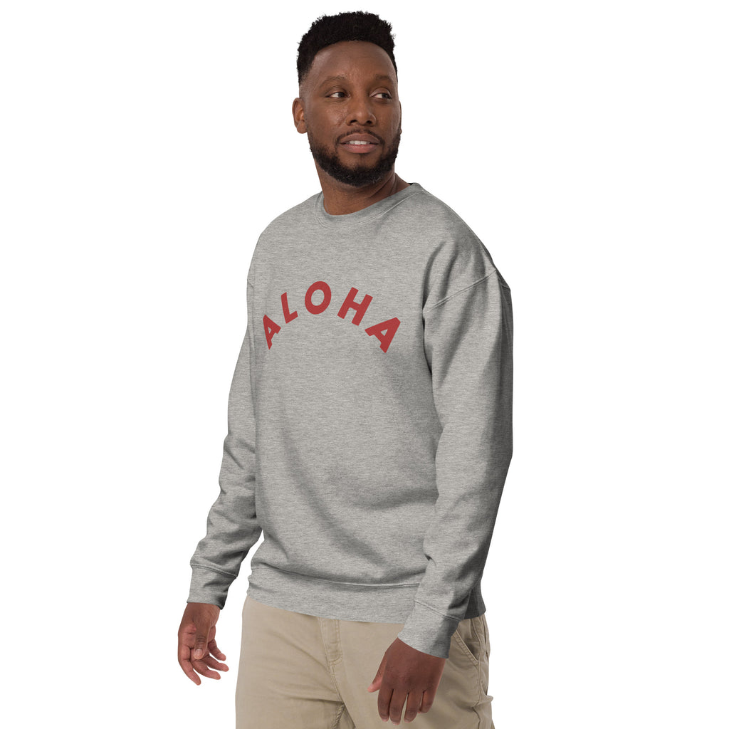 "Aloha" in clean vintage Hawaiian lettering, printed on a SodaPop Cool crew sweatshirt.