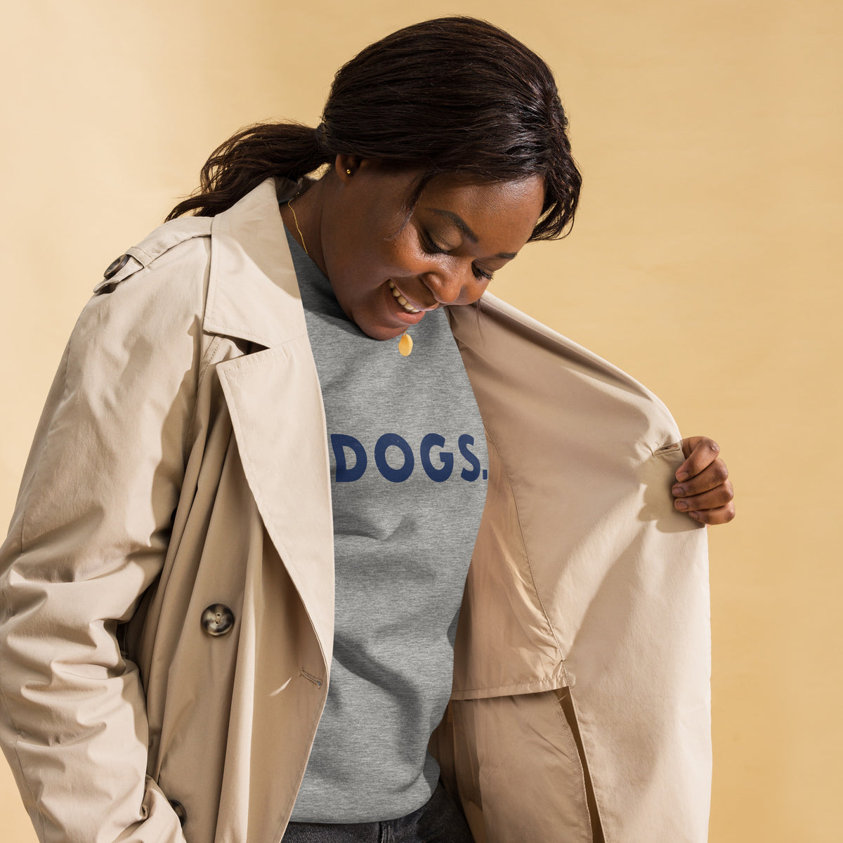 The word "Dogs." with a full stop, in vintage print styling, printed on a SodaPop Cool crew sweatshirt.