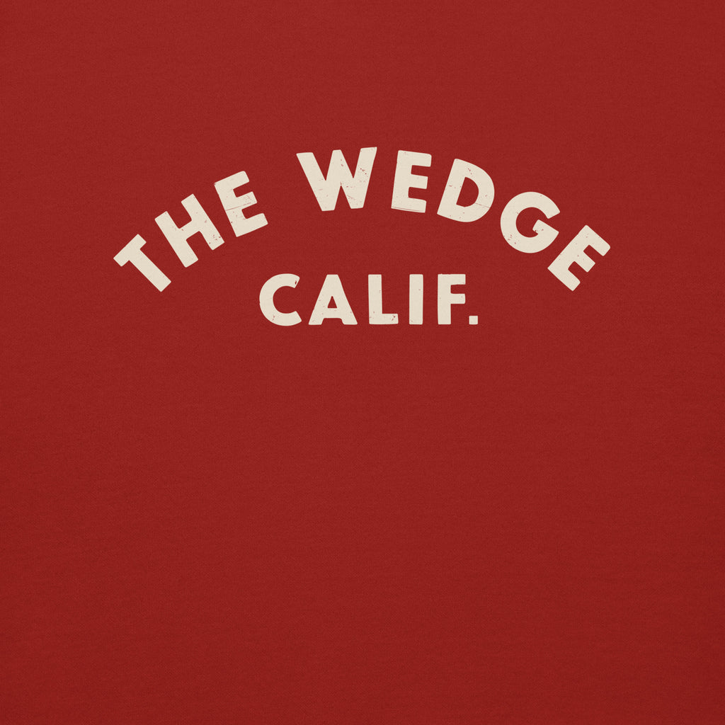 "The Wedge" in classic California surf lettering, printed on a SodaPop Cool crew sweatshirt.