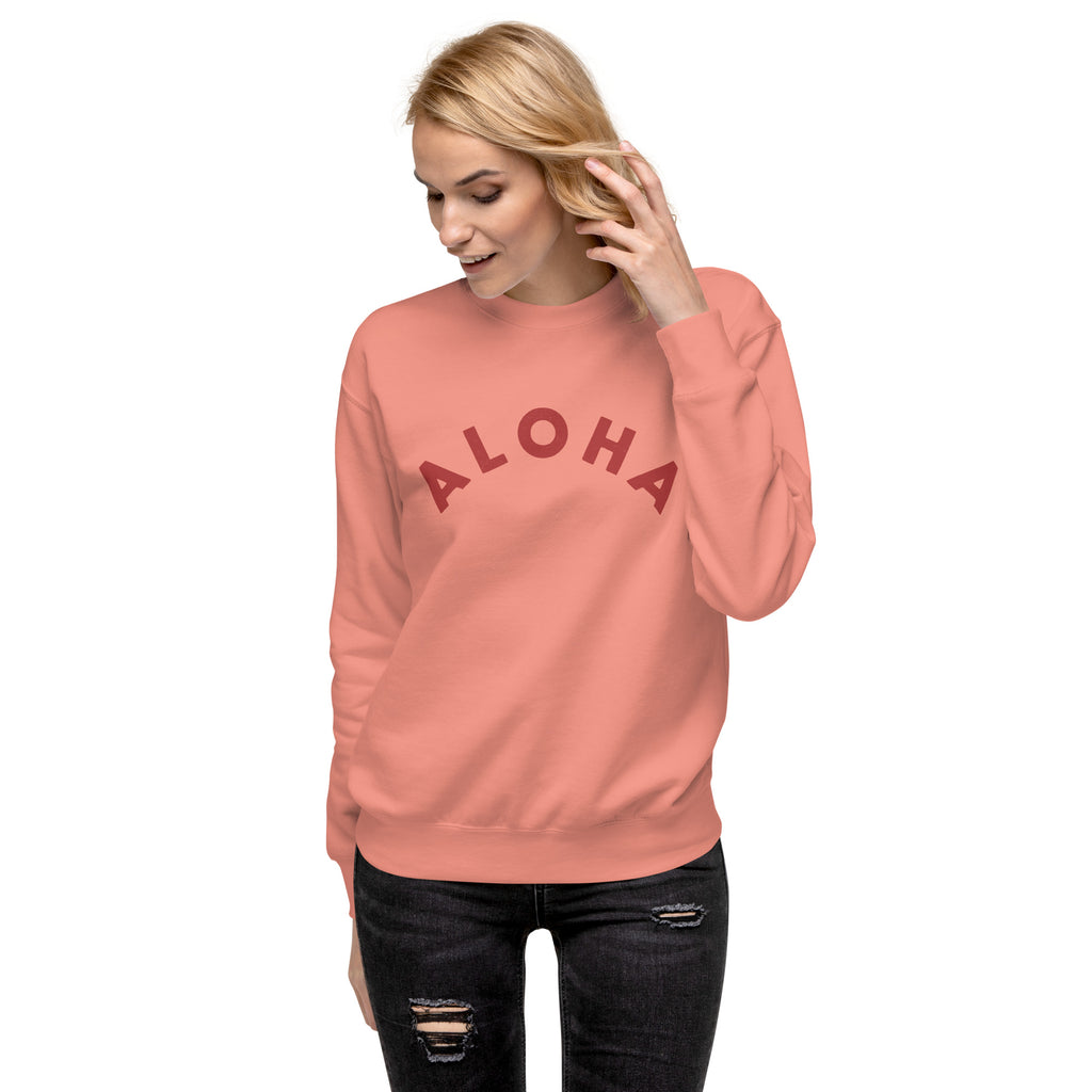 "Aloha" in clean vintage Hawaiian lettering, printed on a SodaPop Cool crew sweatshirt.