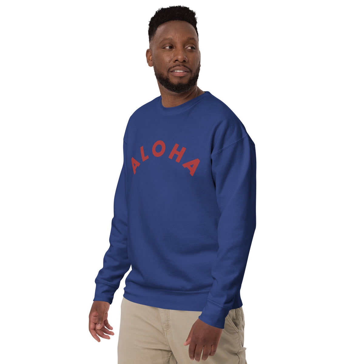 "Aloha" in clean vintage Hawaiian lettering, printed on a SodaPop Cool crew sweatshirt.