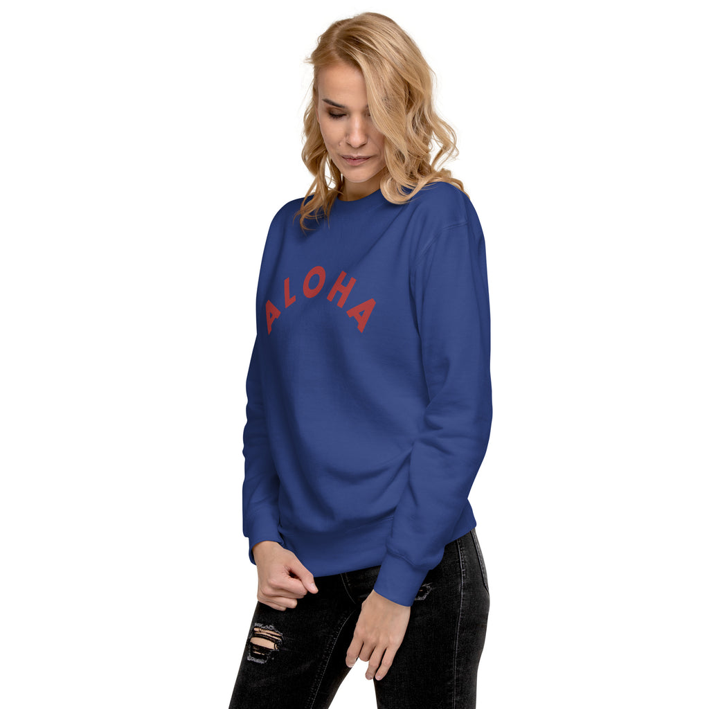 "Aloha" in clean vintage Hawaiian lettering, printed on a SodaPop Cool crew sweatshirt.