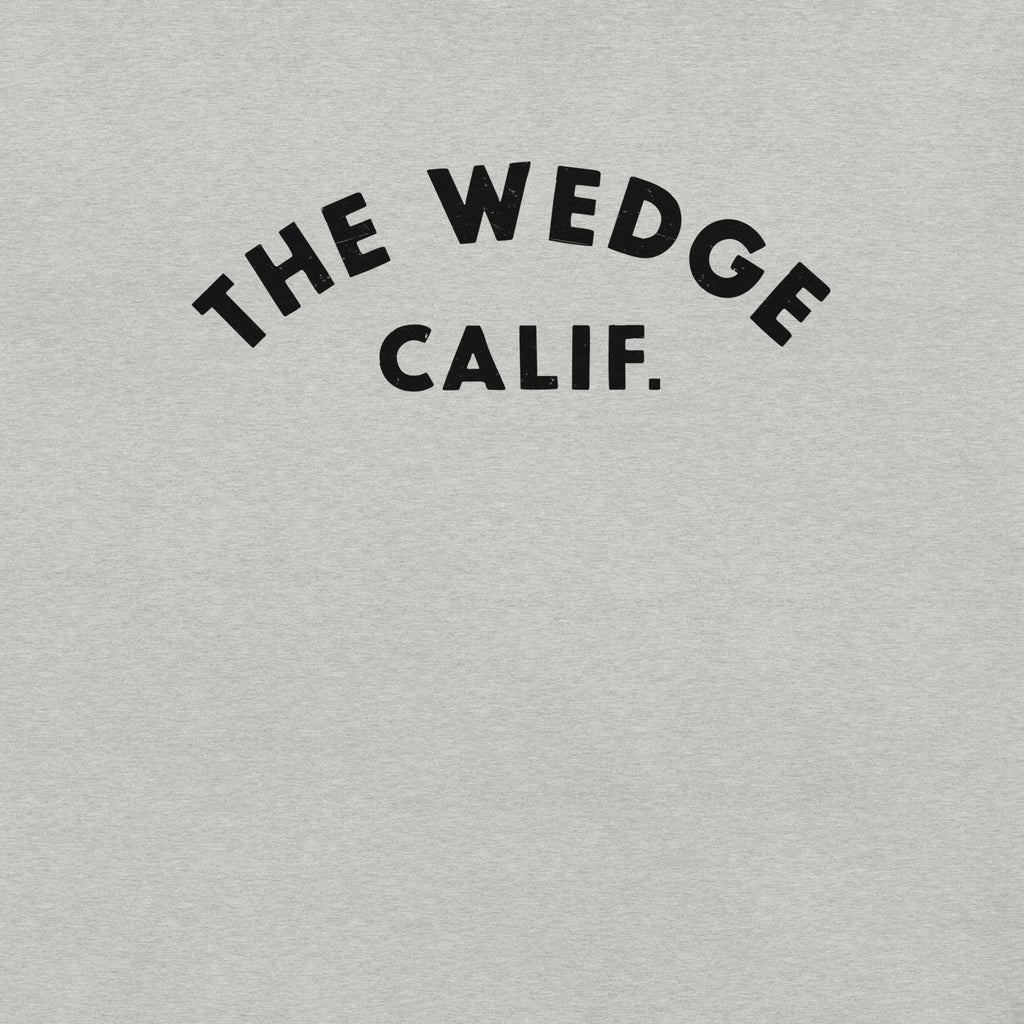 "The Wedge" in classic California surf lettering, printed on a SodaPop Cool t-shirt.