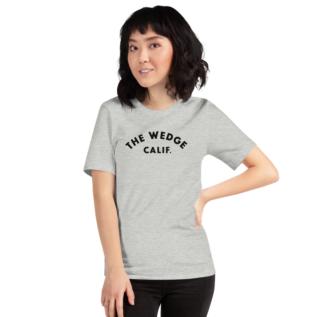 "The Wedge" in classic California surf lettering, printed on a SodaPop Cool t-shirt.