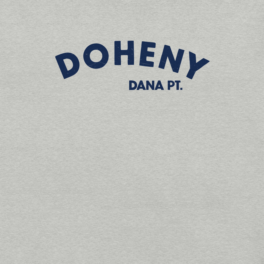 "Doheny Dana Point" in vintage California surf lettering, printed on a SodaPop Cool t-shirt.