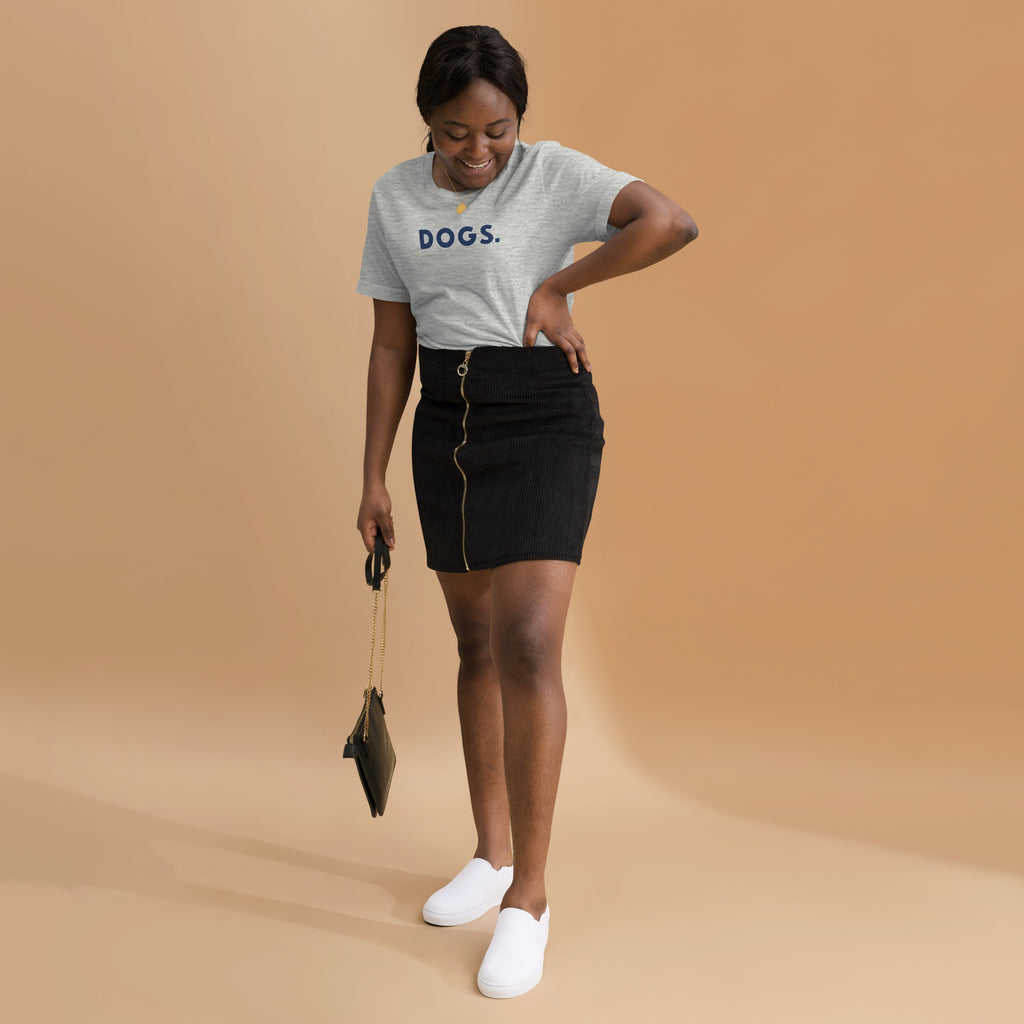 The word "Dogs." with a full stop, in vintage print styling, printed on a SodaPop Cool t-shirt.