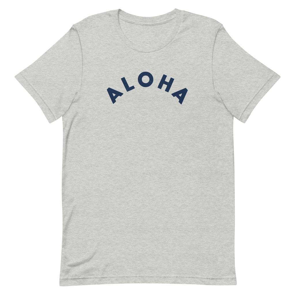 "Aloha" in clean vintage Hawaiian lettering, printed on a SodaPop Cool t-shirt.