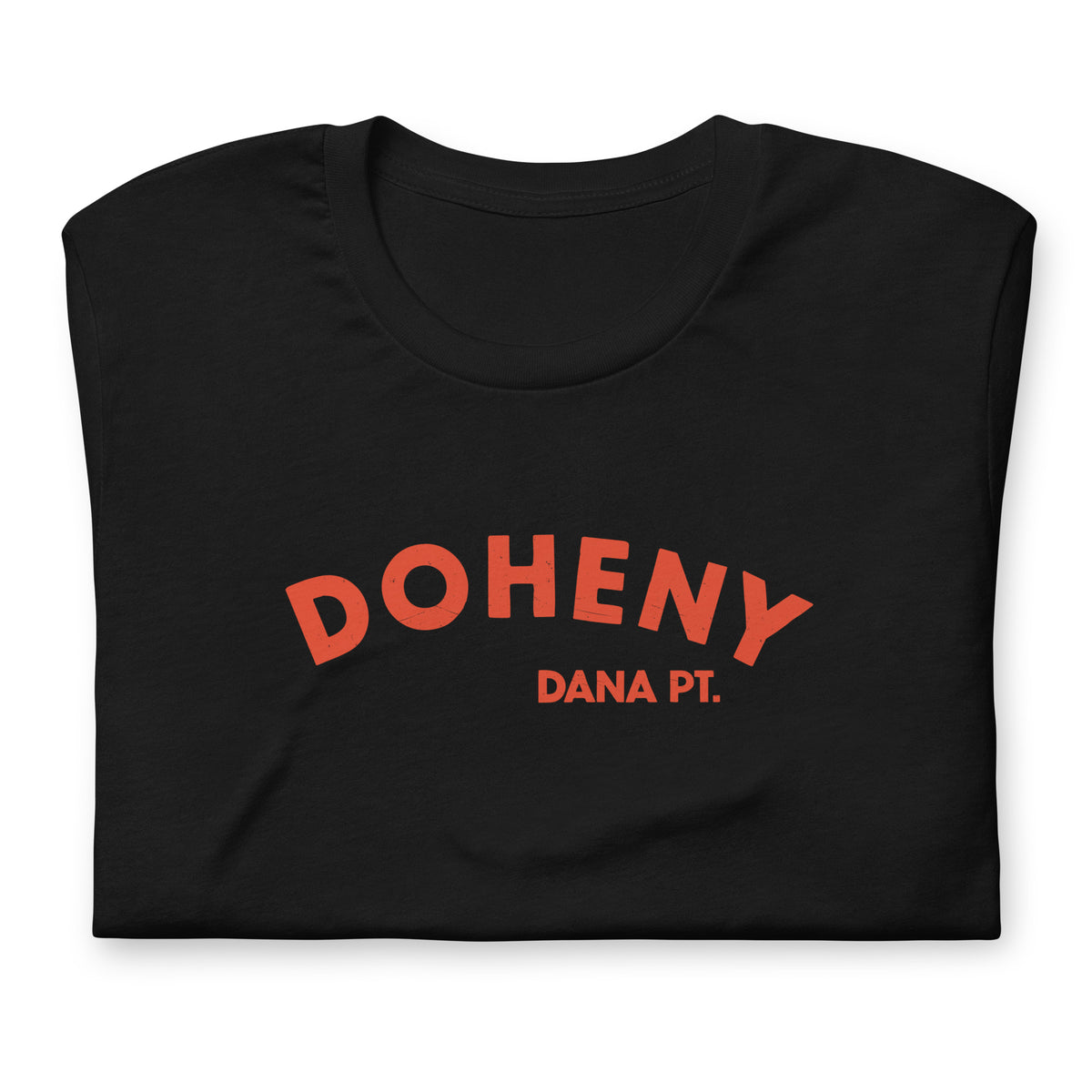 "Doheny Dana Point" in vintage California surf lettering, printed on a SodaPop Cool t-shirt.