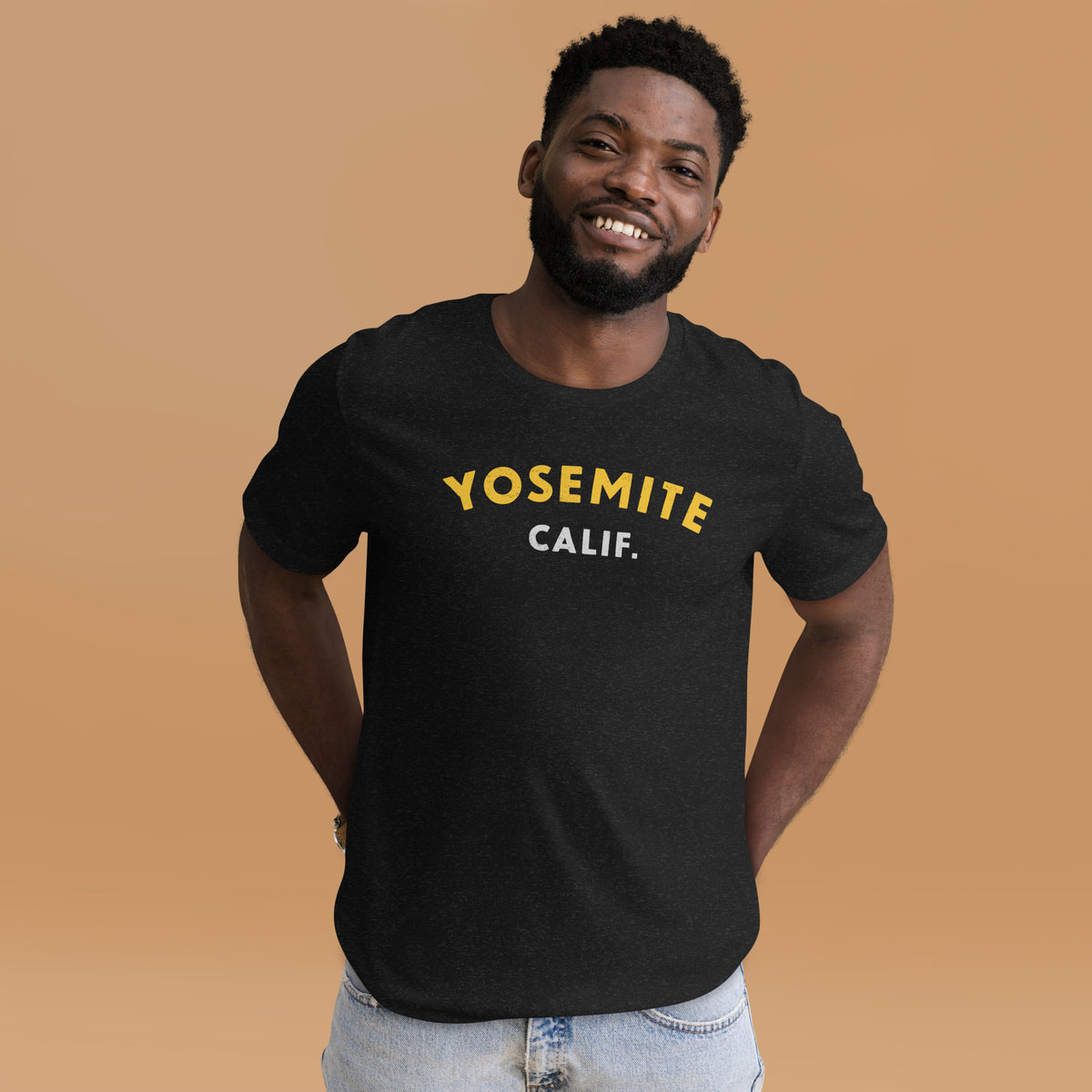 "Yosemite National Park" in vintage park-service lettering, printed on a SodaPop Cool t-shirt.