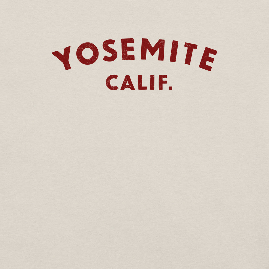 "Yosemite National Park" in vintage park-service lettering, printed on a SodaPop Cool t-shirt.