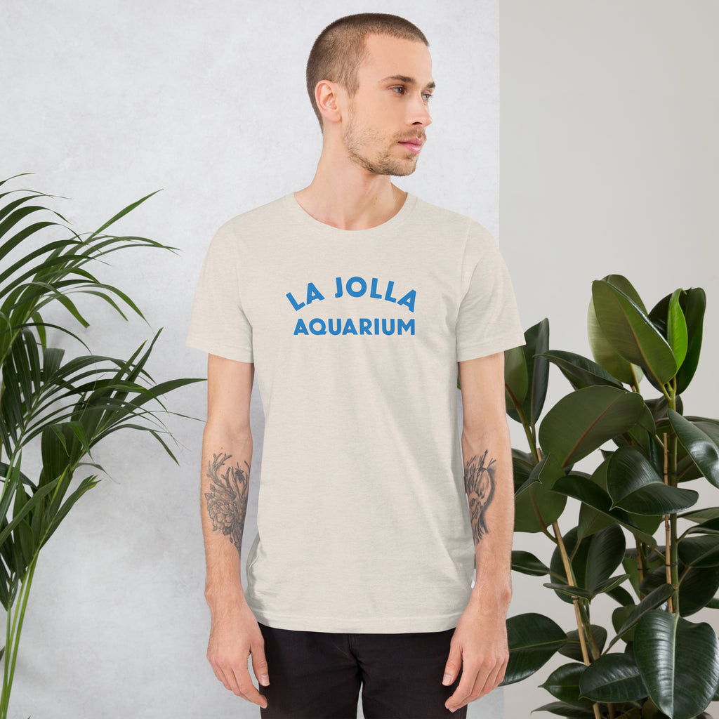 "La Jolla Aquarium" in classic vintage type, printed on a SodaPop Cool t-shirt.