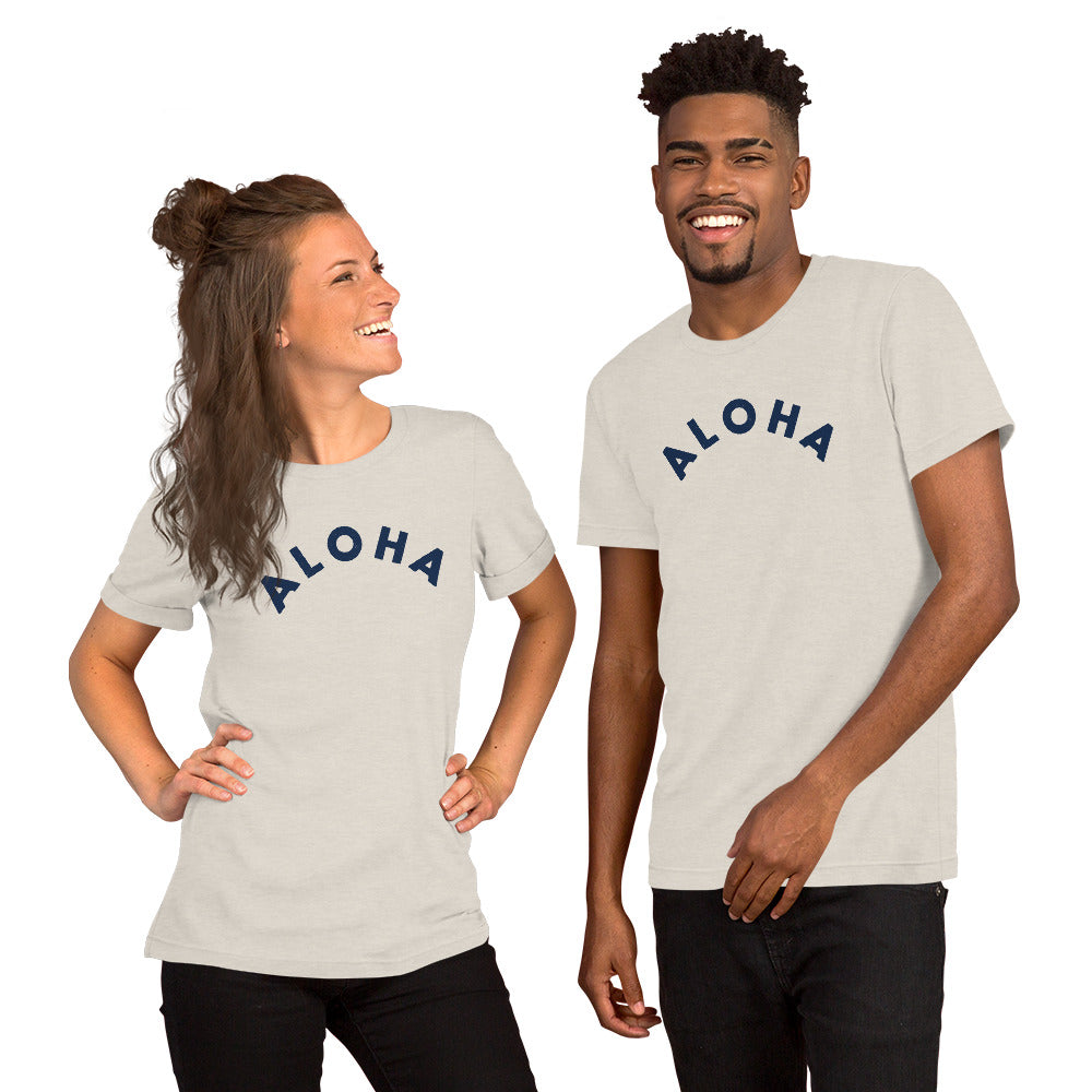 "Aloha" in clean vintage Hawaiian lettering, printed on a SodaPop Cool t-shirt.