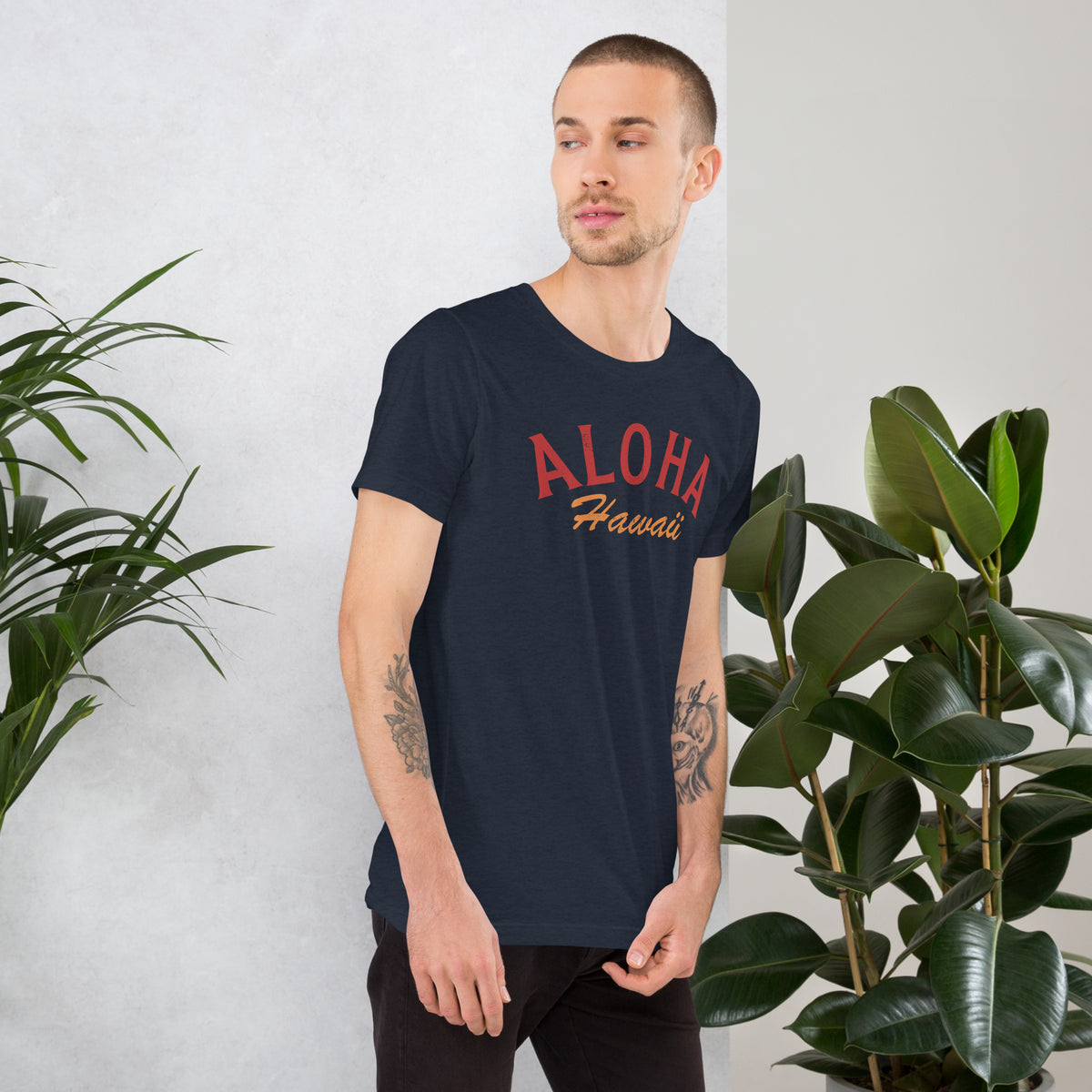 "Aloha Hawaii" in classic vintage island lettering, printed on a SodaPop Cool t-shirt.