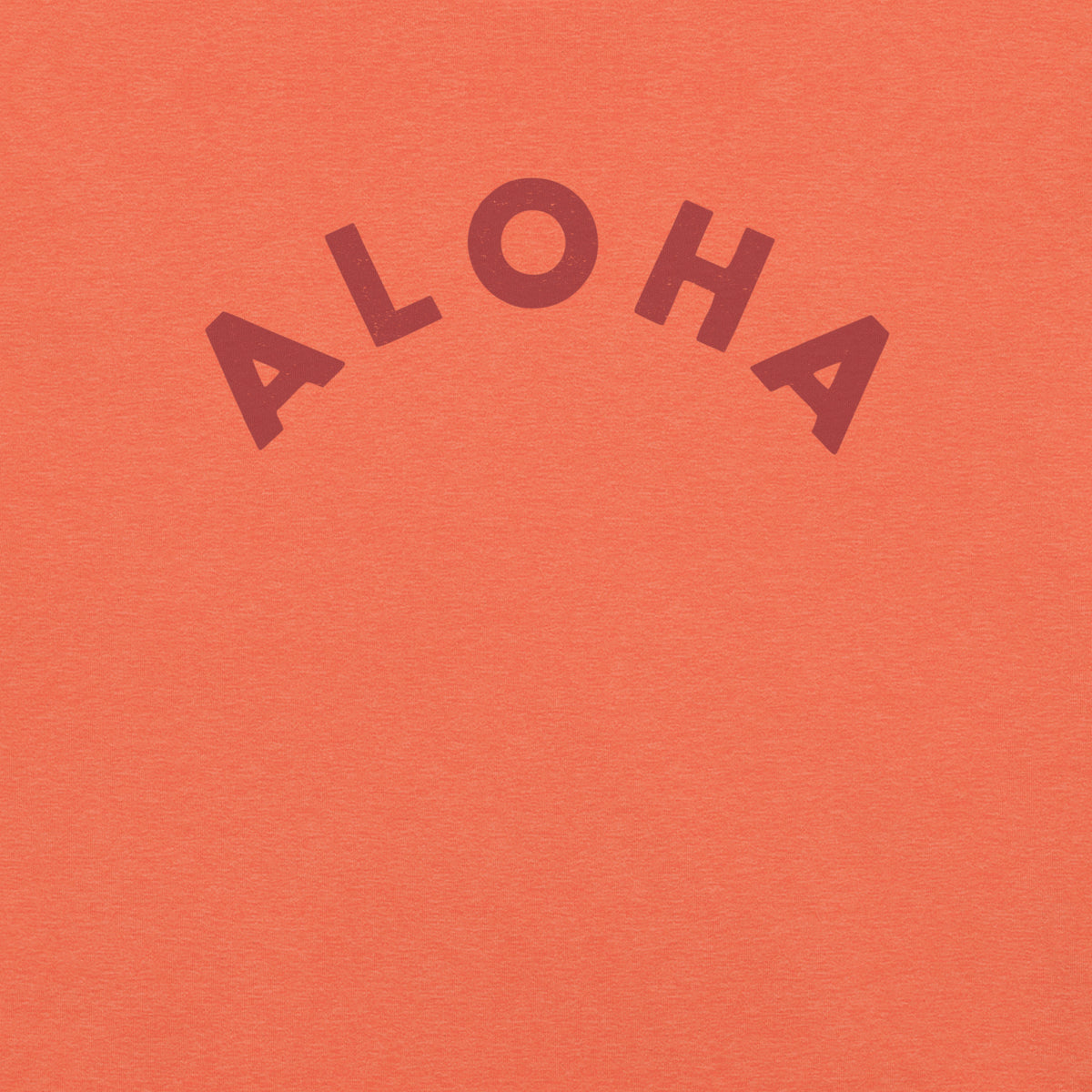 "Aloha" in clean vintage Hawaiian lettering, printed on a SodaPop Cool t-shirt.