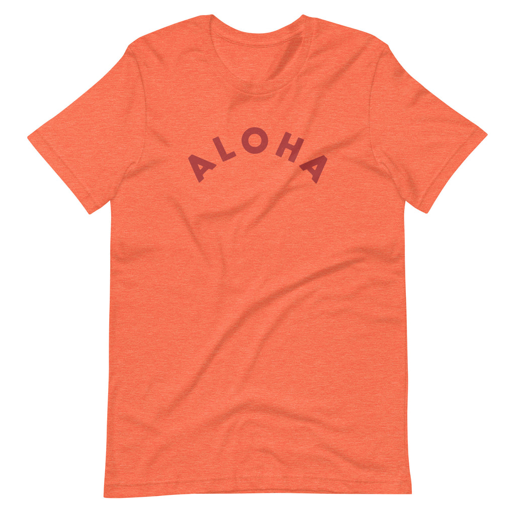 "Aloha" in clean vintage Hawaiian lettering, printed on a SodaPop Cool t-shirt.