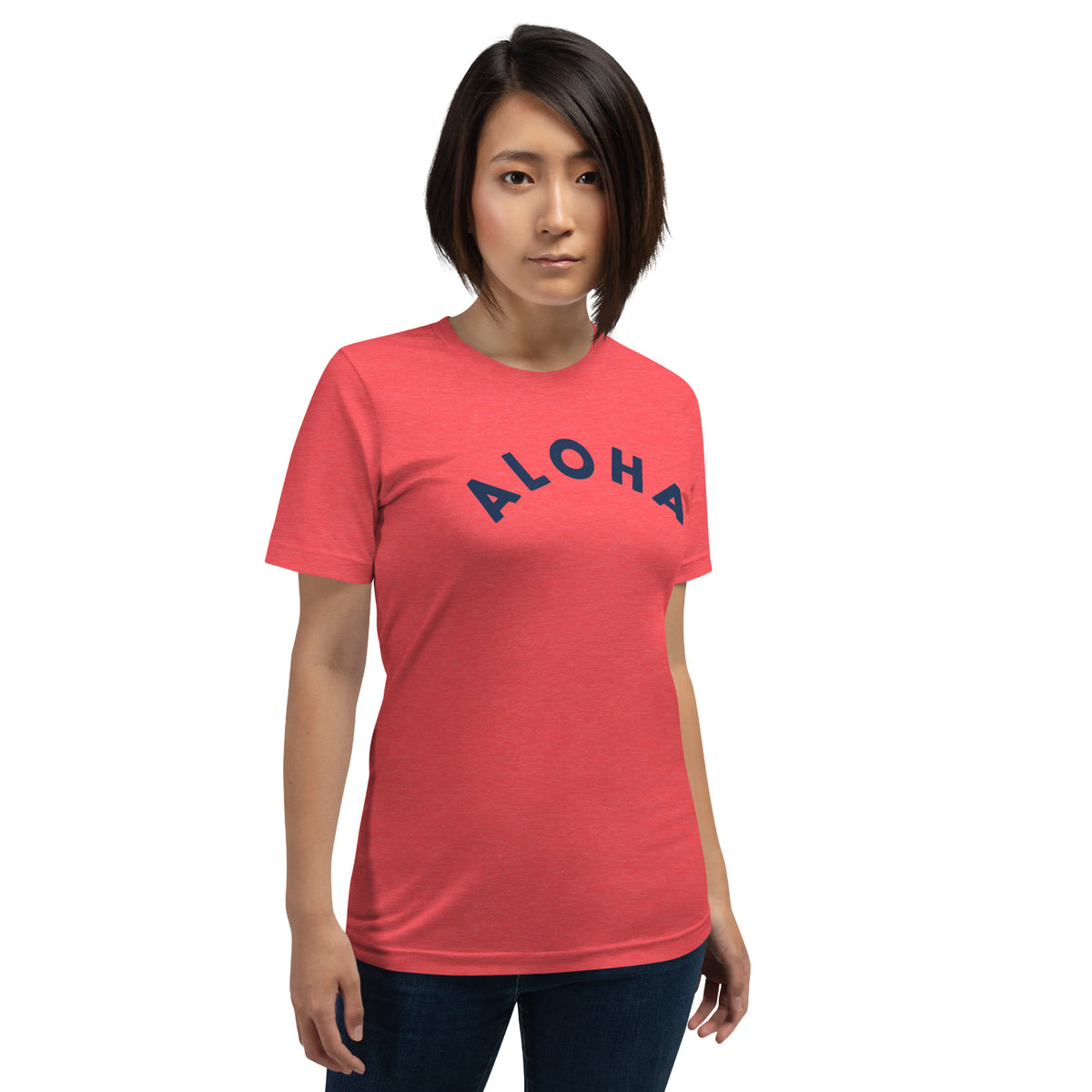 "Aloha" in clean vintage Hawaiian lettering, printed on a SodaPop Cool t-shirt.