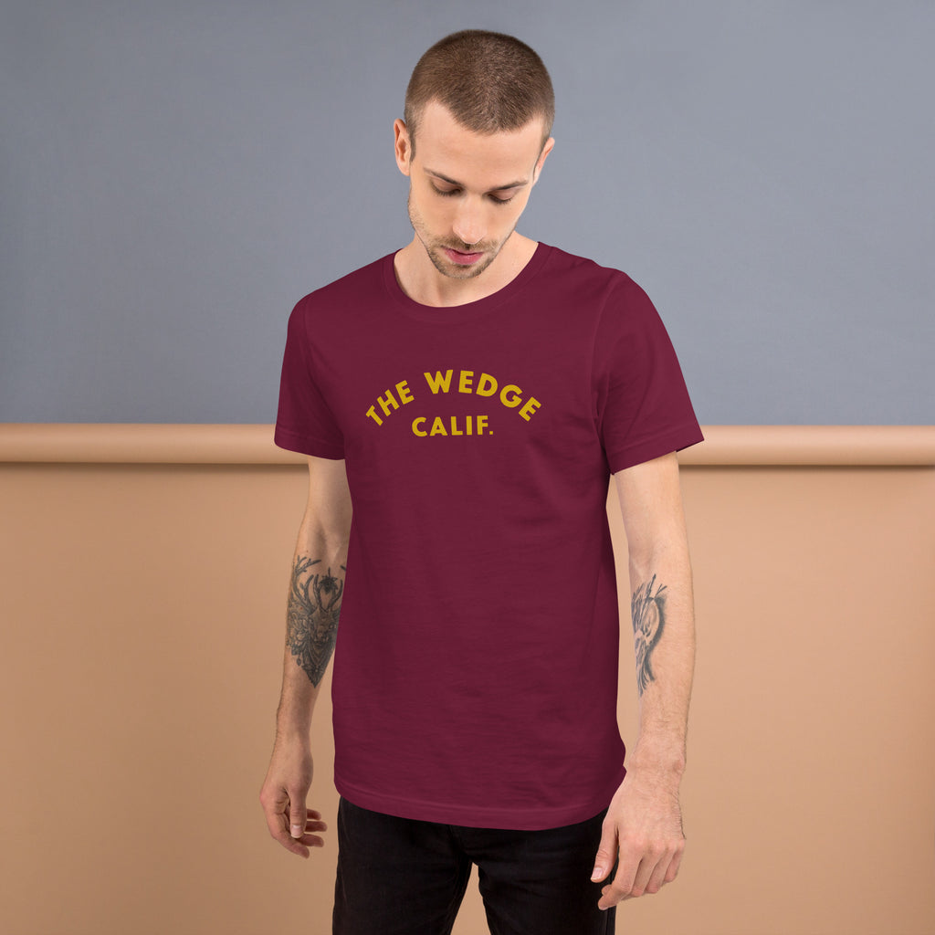 "The Wedge" in classic California surf lettering, printed on a SodaPop Cool t-shirt.