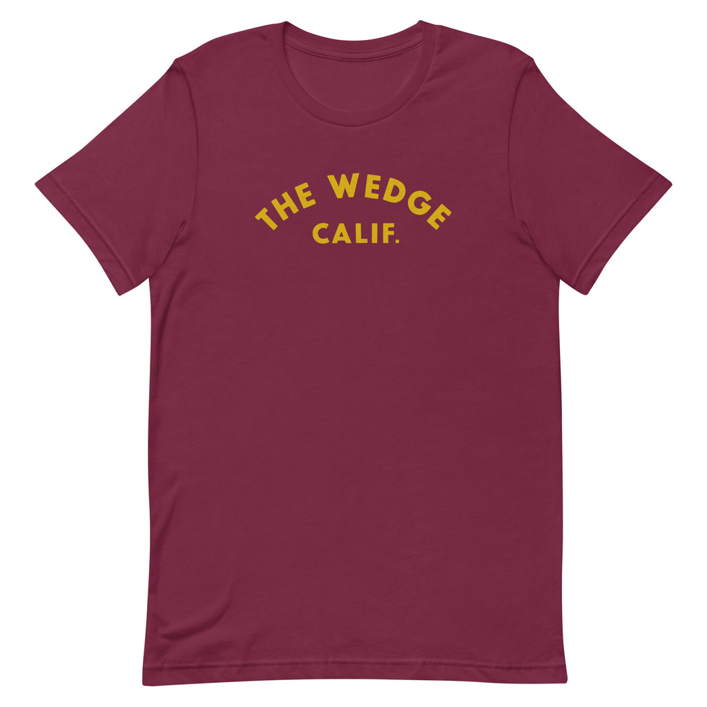 "The Wedge" in classic California surf lettering, printed on a SodaPop Cool t-shirt.