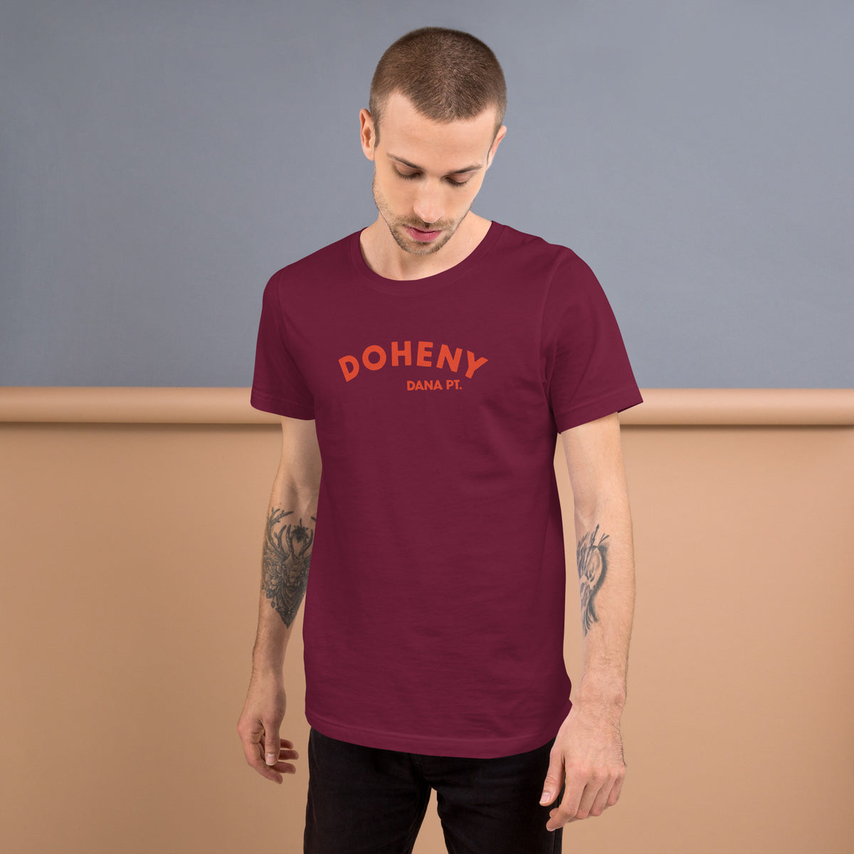 "Doheny Dana Point" in vintage California surf lettering, printed on a SodaPop Cool t-shirt.
