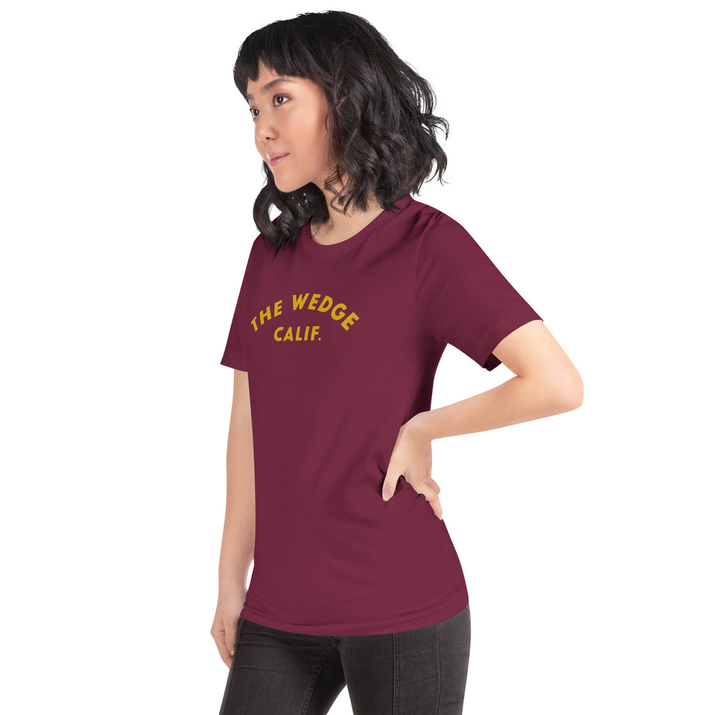"The Wedge" in classic California surf lettering, printed on a SodaPop Cool t-shirt.