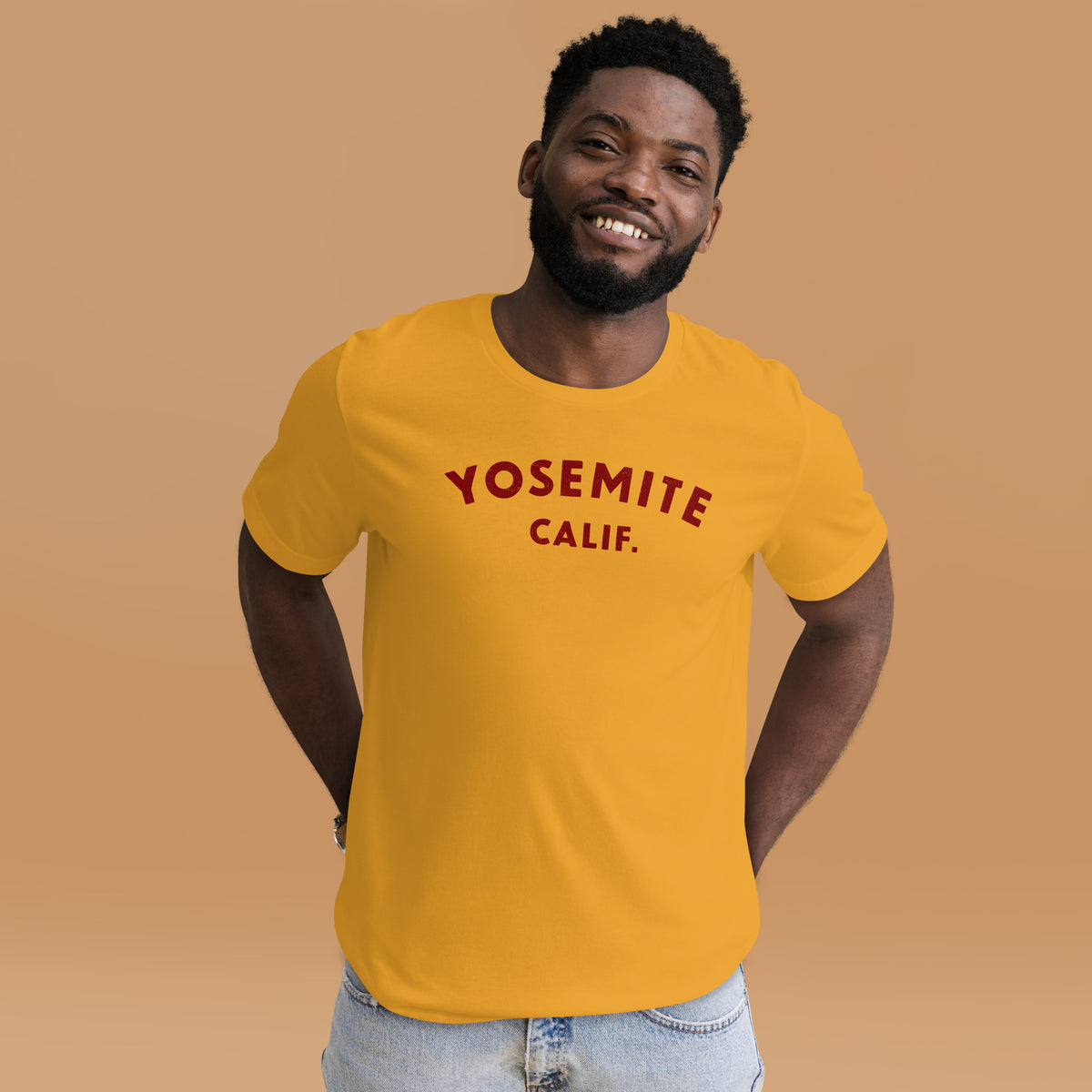 "Yosemite National Park" in vintage park-service lettering, printed on a SodaPop Cool t-shirt.