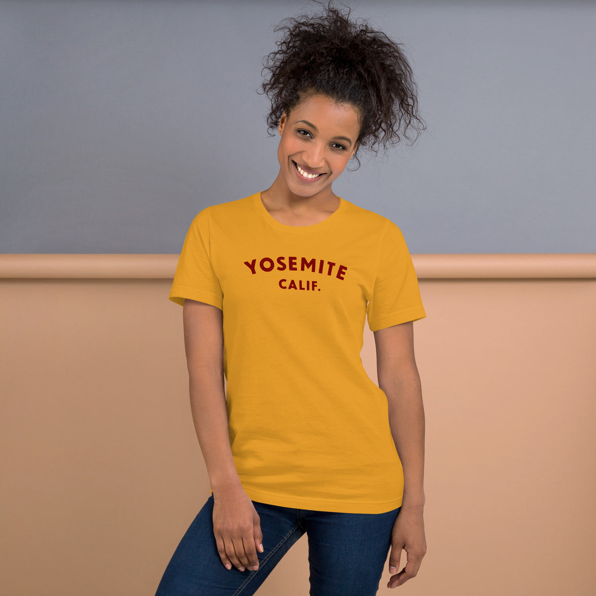 "Yosemite National Park" in vintage park-service lettering, printed on a SodaPop Cool t-shirt.