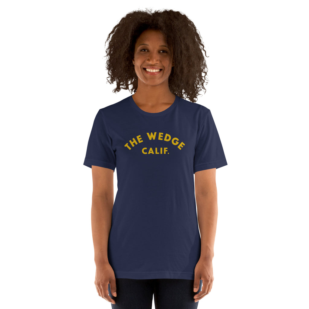 "The Wedge" in classic California surf lettering, printed on a SodaPop Cool t-shirt.