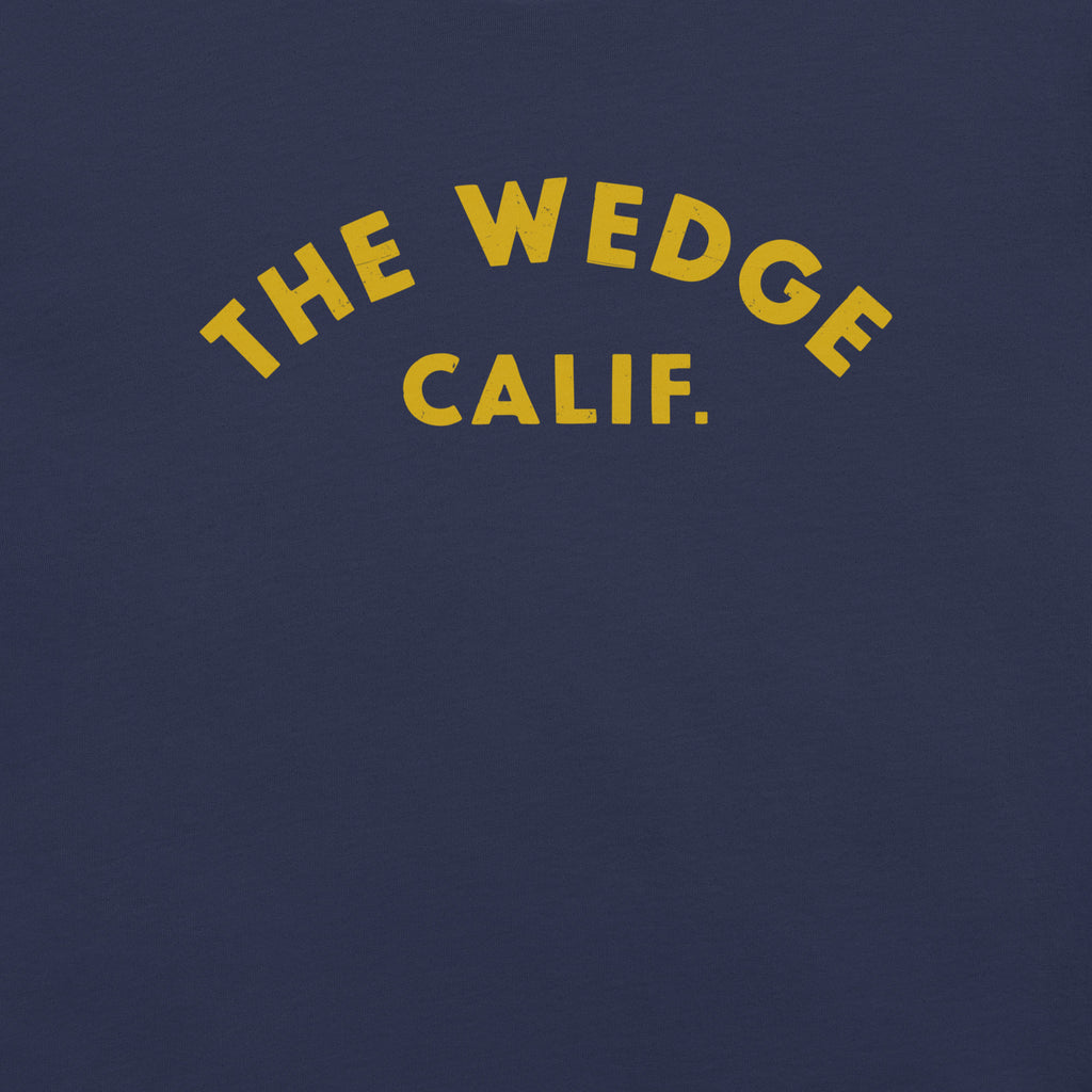 "The Wedge" in classic California surf lettering, printed on a SodaPop Cool t-shirt.