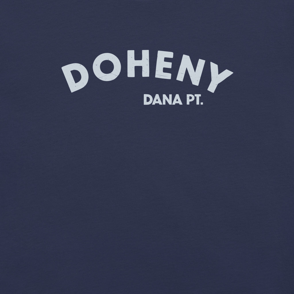 "Doheny Dana Point" in vintage California surf lettering, printed on a SodaPop Cool t-shirt.