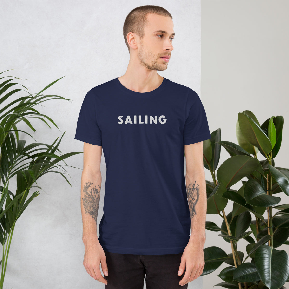 The word "Sailing" in clean vintage lettering, printed on a SodaPop Cool t-shirt.