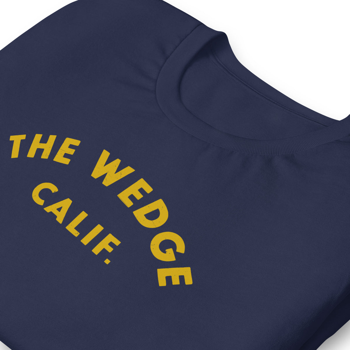 "The Wedge" in classic California surf lettering, printed on a SodaPop Cool t-shirt.
