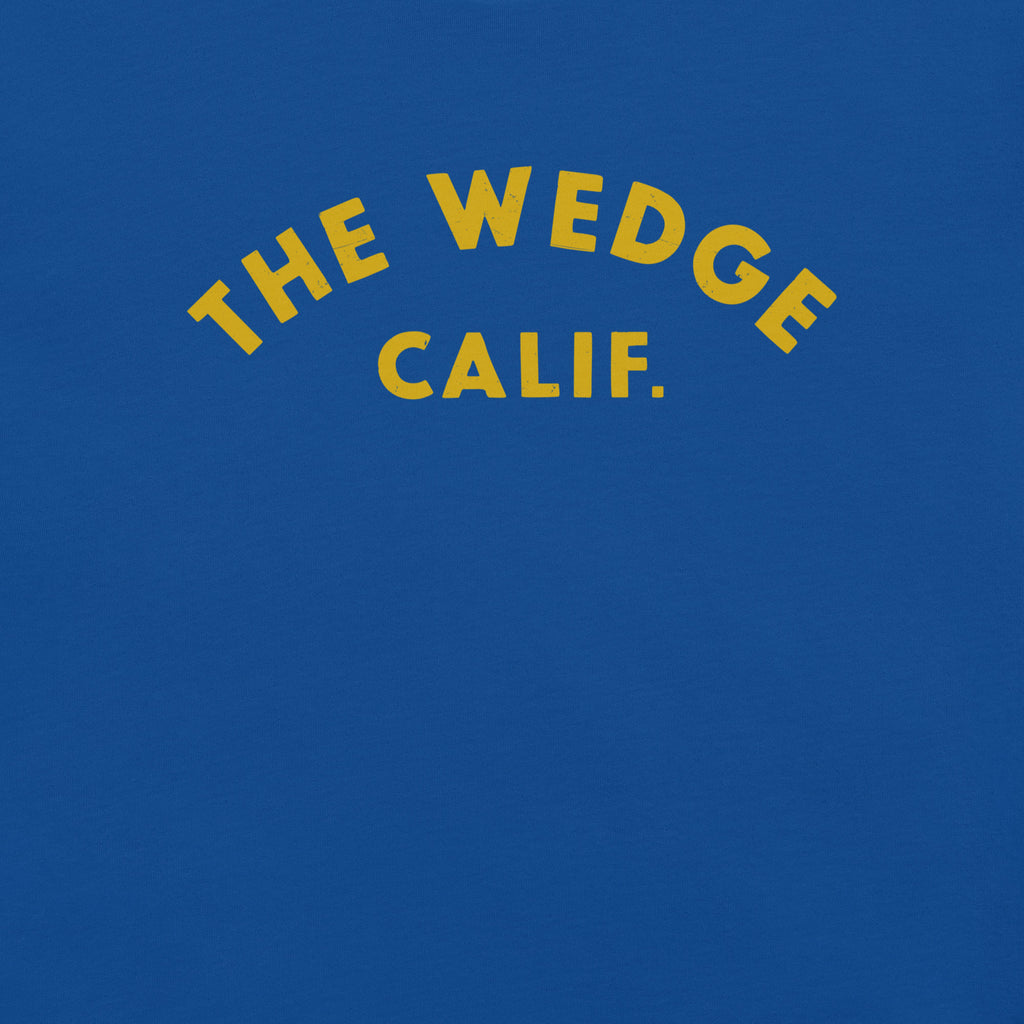 "The Wedge" in classic California surf lettering, printed on a SodaPop Cool t-shirt.