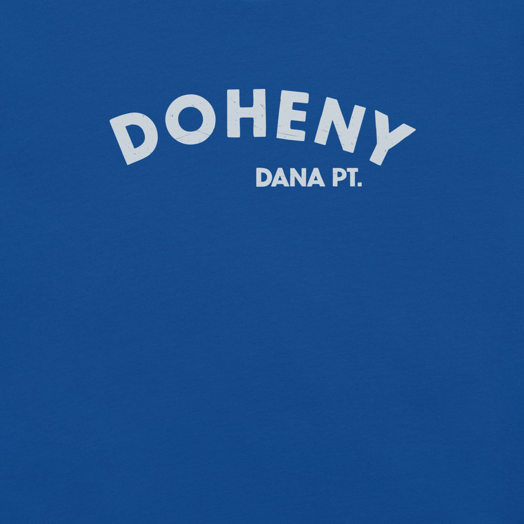 "Doheny Dana Point" in vintage California surf lettering, printed on a SodaPop Cool t-shirt.