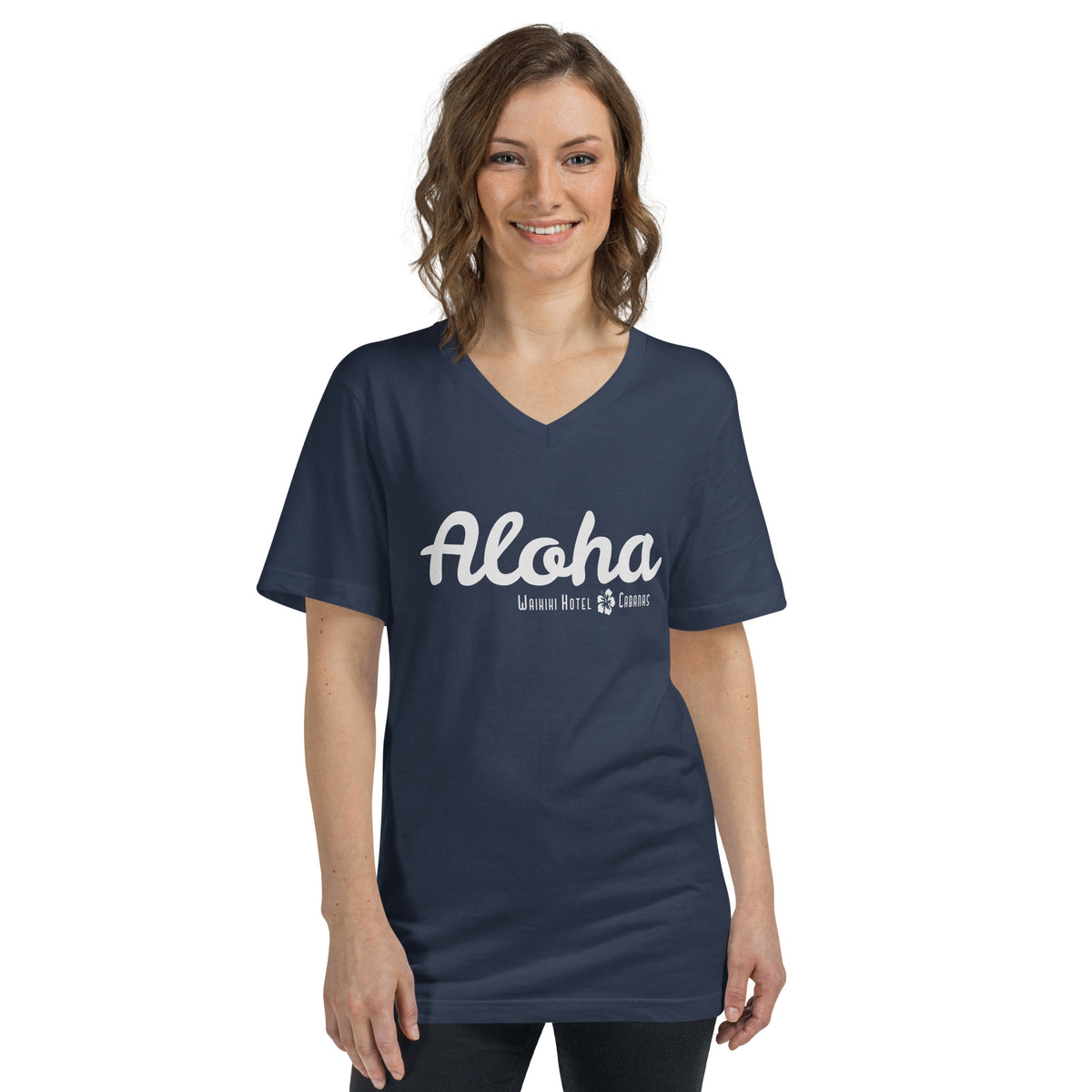 "Waikiki Hotel &amp; Cabanas" in vintage Hawaiian resort lettering, printed on a SodaPop Cool v-neck t-shirt.