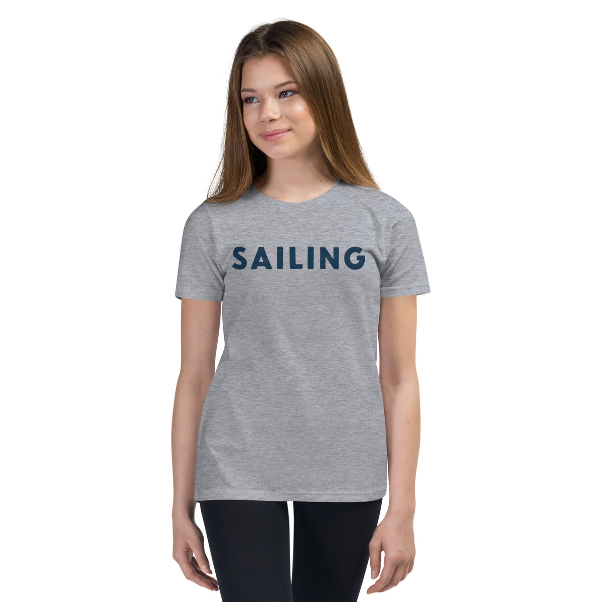 The word "Sailing" in clean vintage lettering, printed on a SodaPop Cool kids t-shirt.