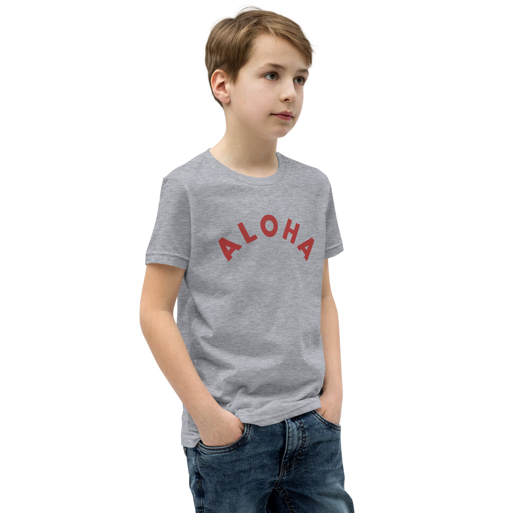 "Aloha" in clean vintage Hawaiian lettering, printed on a SodaPop Cool kids t-shirt.