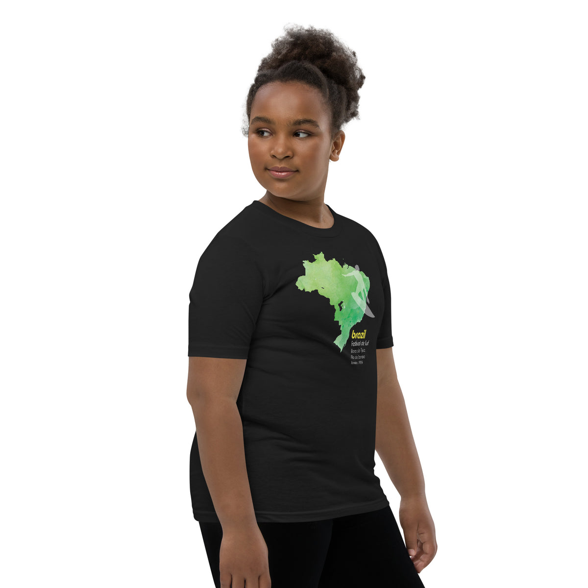 Brazil country outline with a surfer figure and "1984", vintage surf festival poster styling, printed on a SodaPop Cool kids t-shirt.