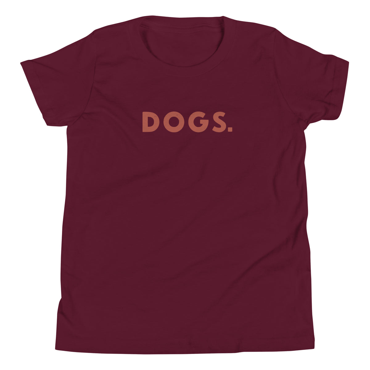 The word "Dogs." with a full stop, in vintage print styling, printed on a SodaPop Cool kids t-shirt.
